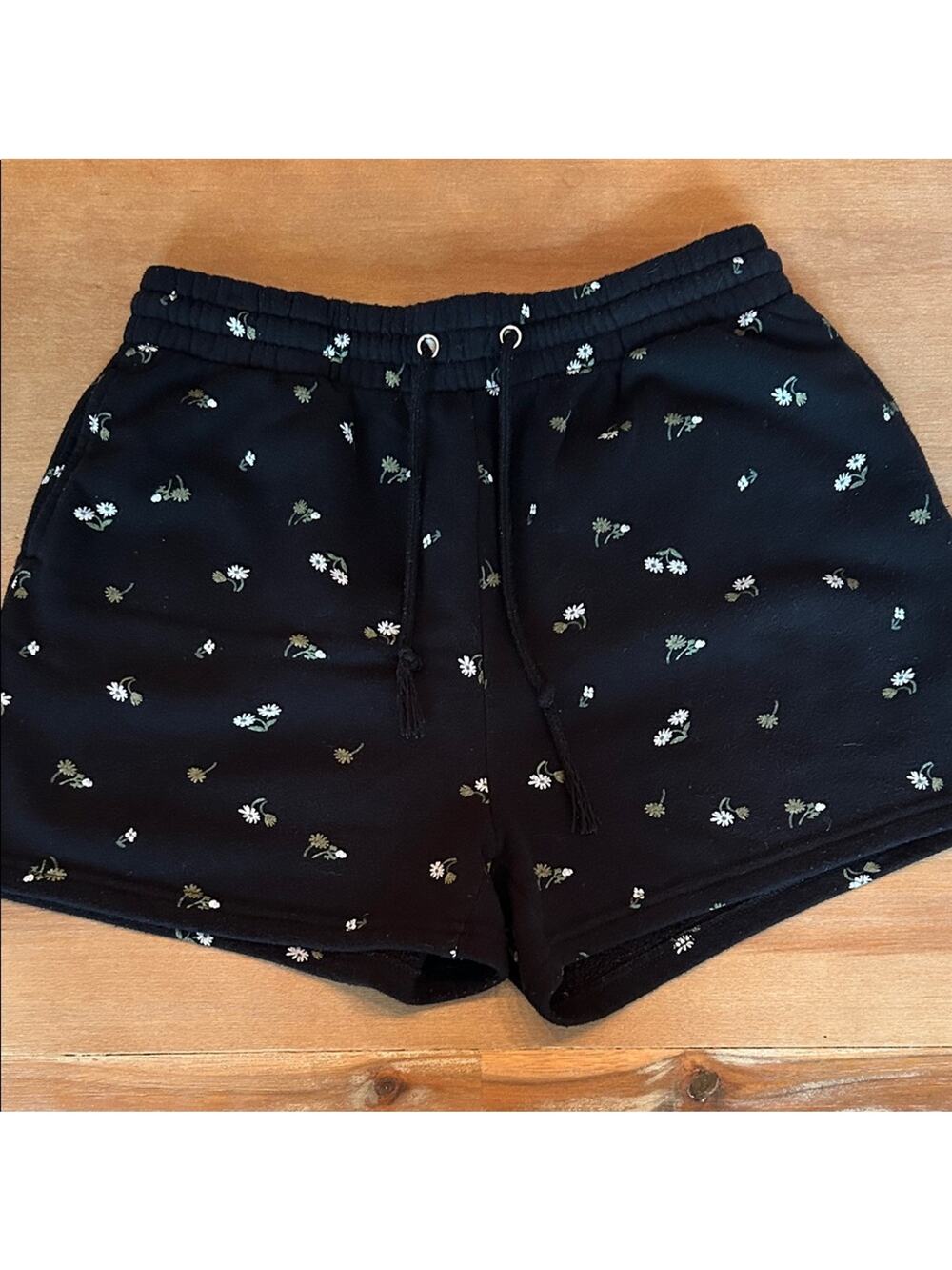 Floral Black Women's Athletic Sweat Shorts. Pockets and drawstring waist.